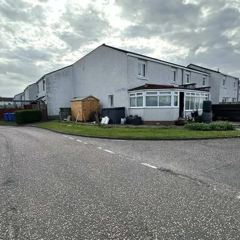 An open front garden, enclosed — before the work started